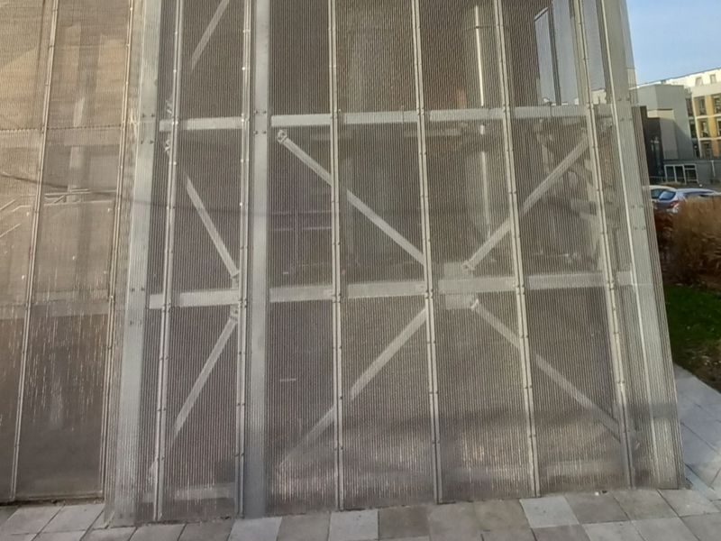 Flue stack and plant screening facades